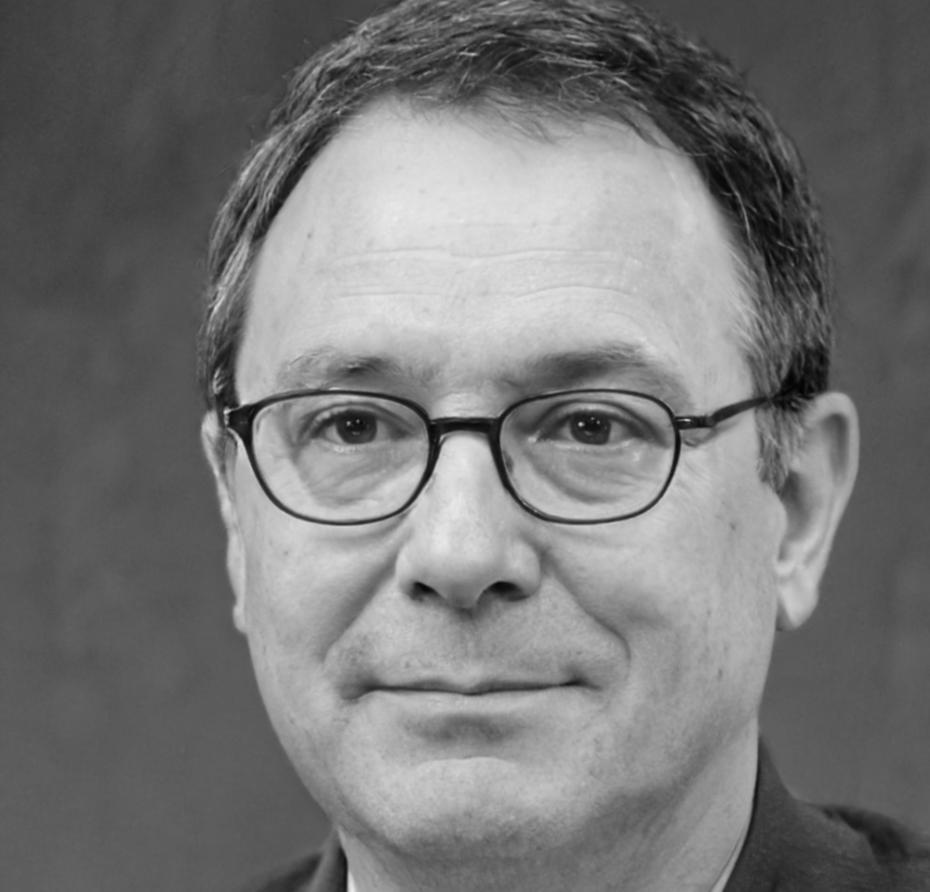 Kieran Thorvaldsen teaching cryptographic concepts at whiteboard